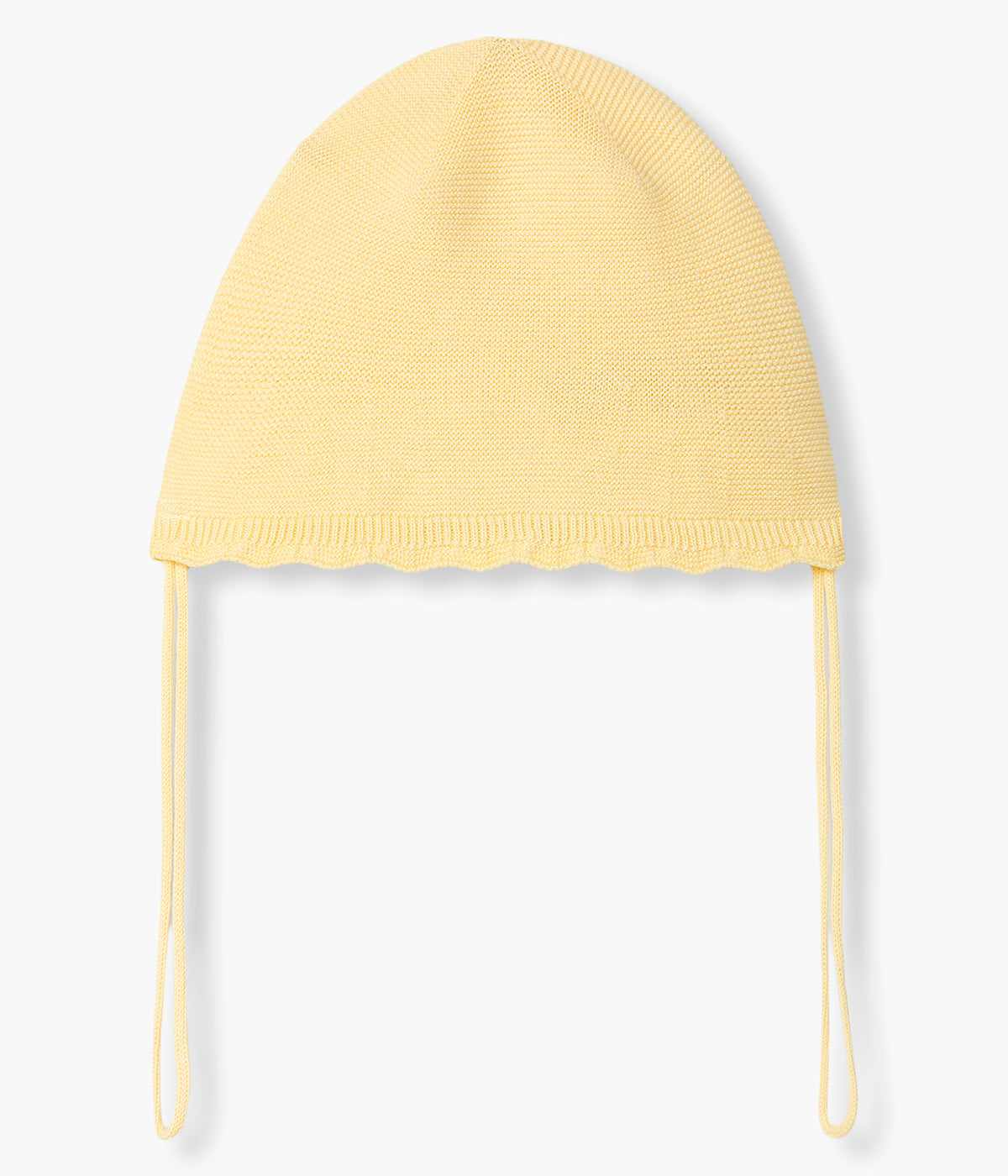 Vista de frente do chapéu em malha de algodão orgânico amarelo sem costuras no interior da Wedoble para bebé e recém-nascido(a). Efeito ondulado a toda a volta. Tiras para atar no queixo.