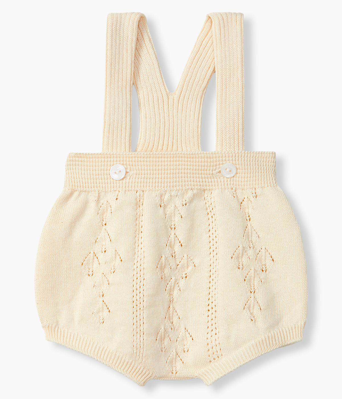 Vista de frente do fofo em malha de algodão orgânico bege da Wedoble para bebé e recém-nascido(a). Delicado fofo de alças com detalhes perfurados. Abertura nas alças.