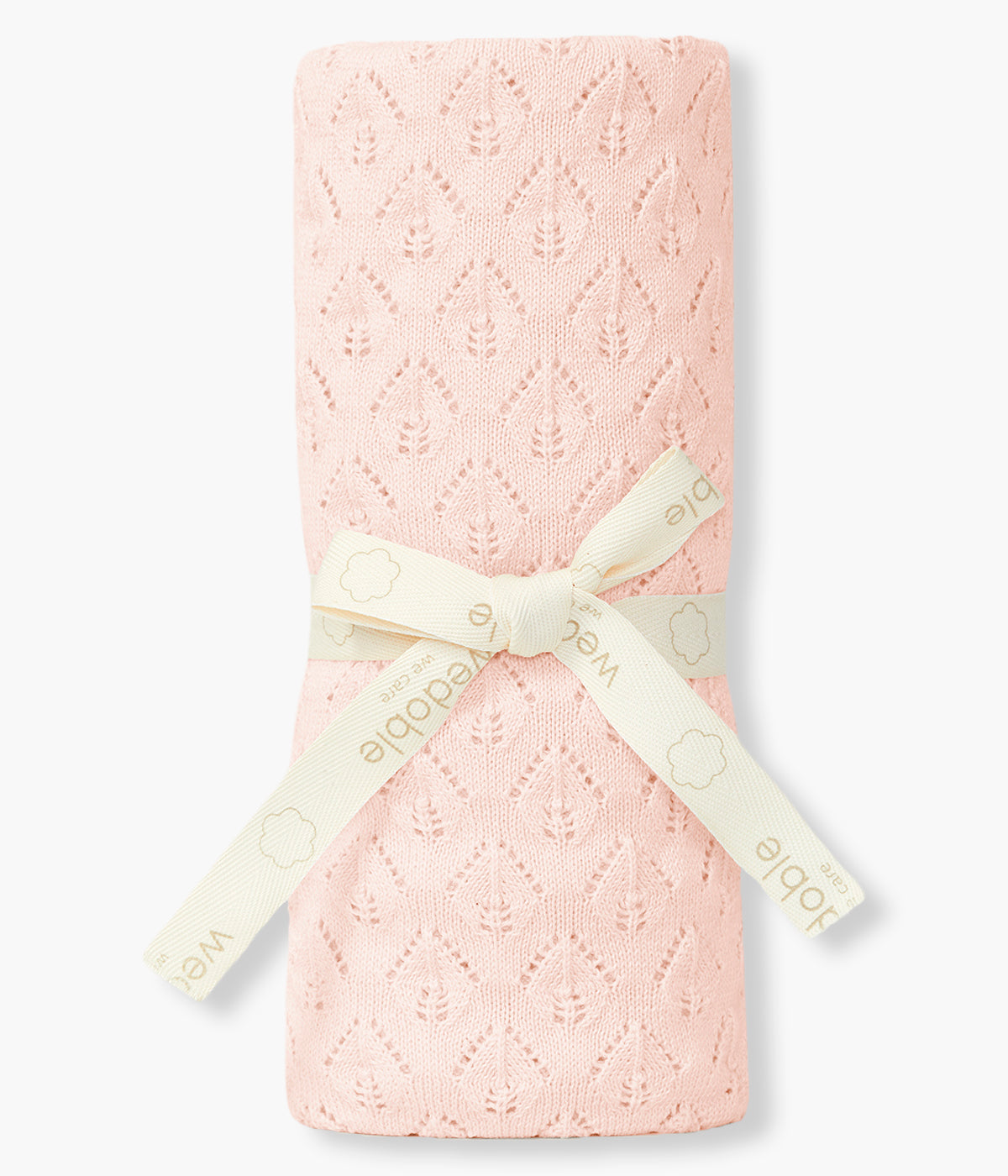 Manta em malha de algodão orgânico rosa da Wedoble para bebé menina e recém-nascida. Delicada manta de formato retangular com detalhes perfurados.