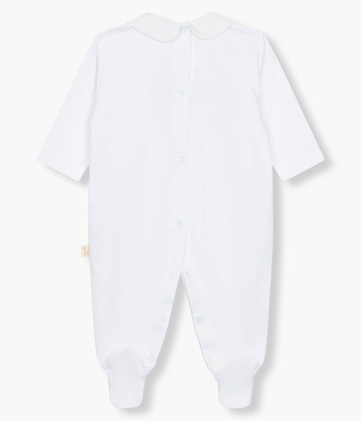 Vista de costas do babygrow em algodão branco da Baby Gi para bebé menina e recém-nascida. Gola redonda cortada e bordado floral na frente. Abertura com molas de pressão nas costas e entrepernas.