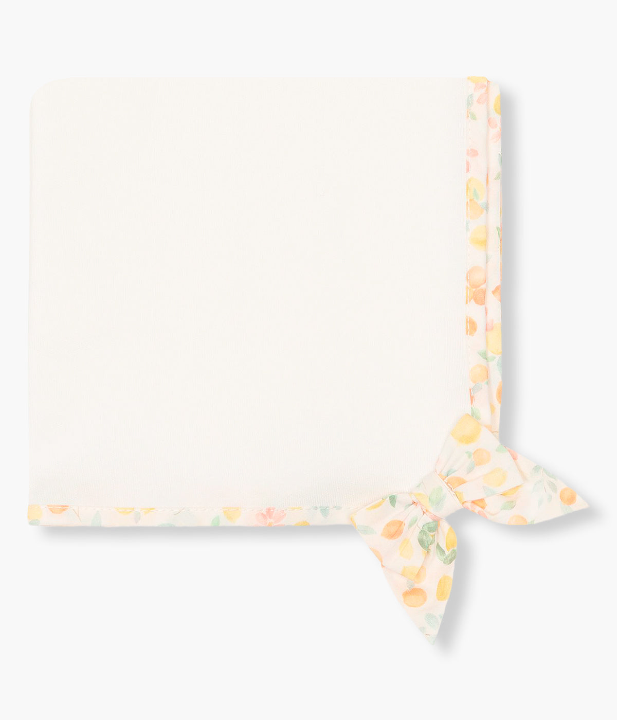 Vista de frente da fralda pérola da Baby Gi para bebé menina e recém-nascida, 100% algodão. Laço no canto e contorno a toda a volta com padrão frutas coloridas.