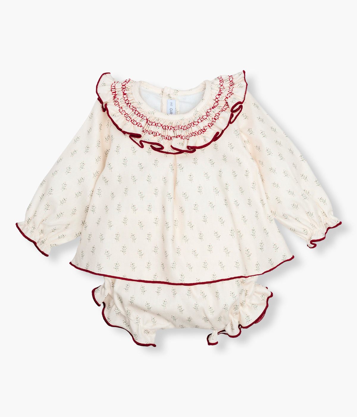 Vista frontal do vestido com tapa fraldas da Calamaro Baby para bebé menina e recém-nascida, 100% algodão. Elegante vestido com padrão de pequenos ramos verdes. Gola folho, punhos e contorno inferior em bordô.