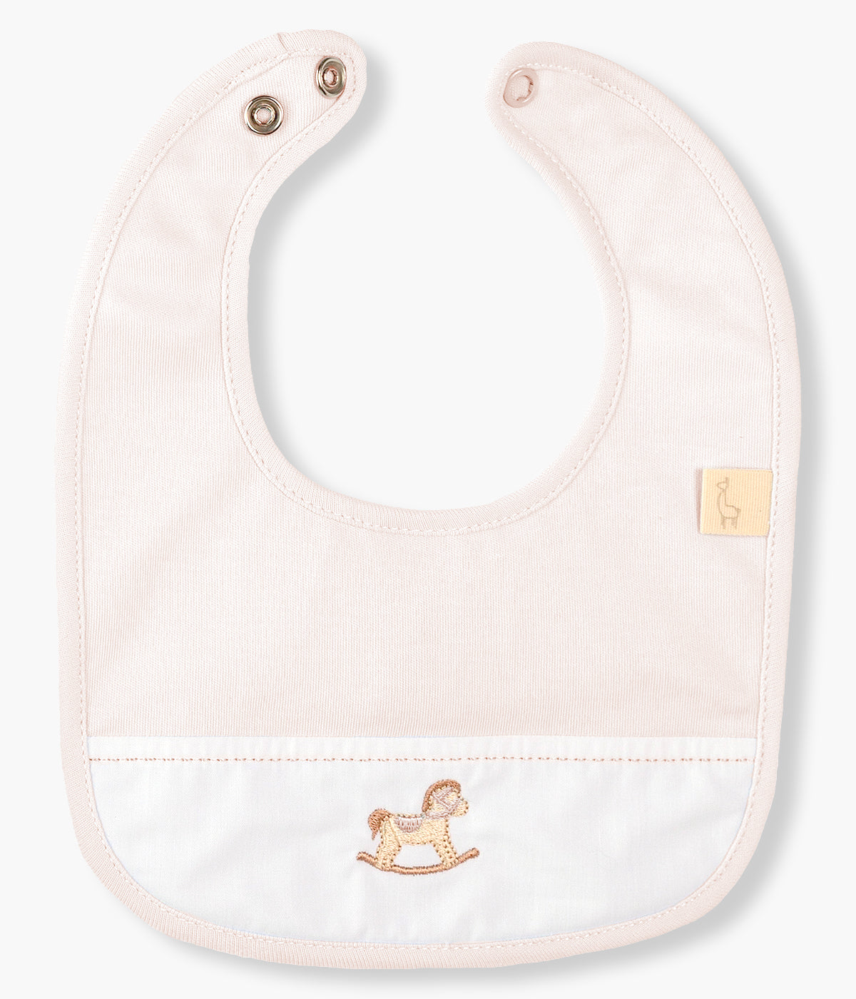 Babete impermeável rosa da Baby Gi para bebé menina e recém-nascida, 100% algodão. Detalhe de tecido branco na frente com pequeno cavalo de madeira bordado.