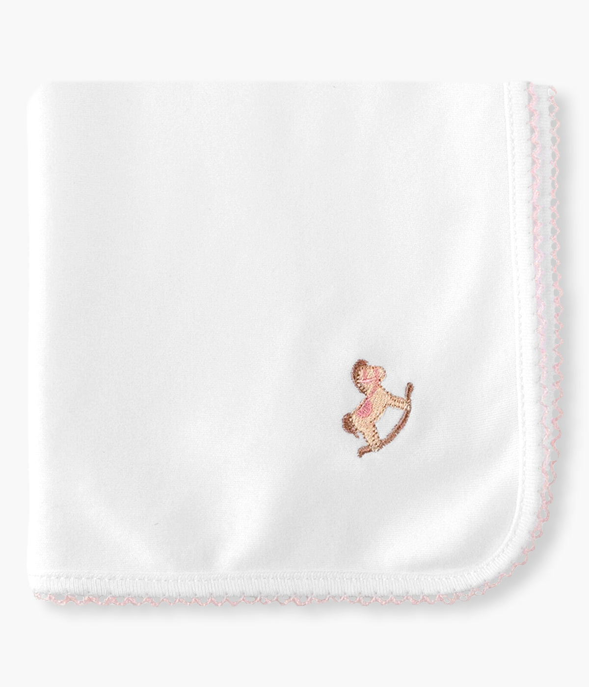 Vista frontal dobrada da fralda branca da Baby Gi para bebé menina e recém-nascida, 100% algodão. Contorno a toda a volta em picueta rosa. Bordado no canto com cavalo e madeira.