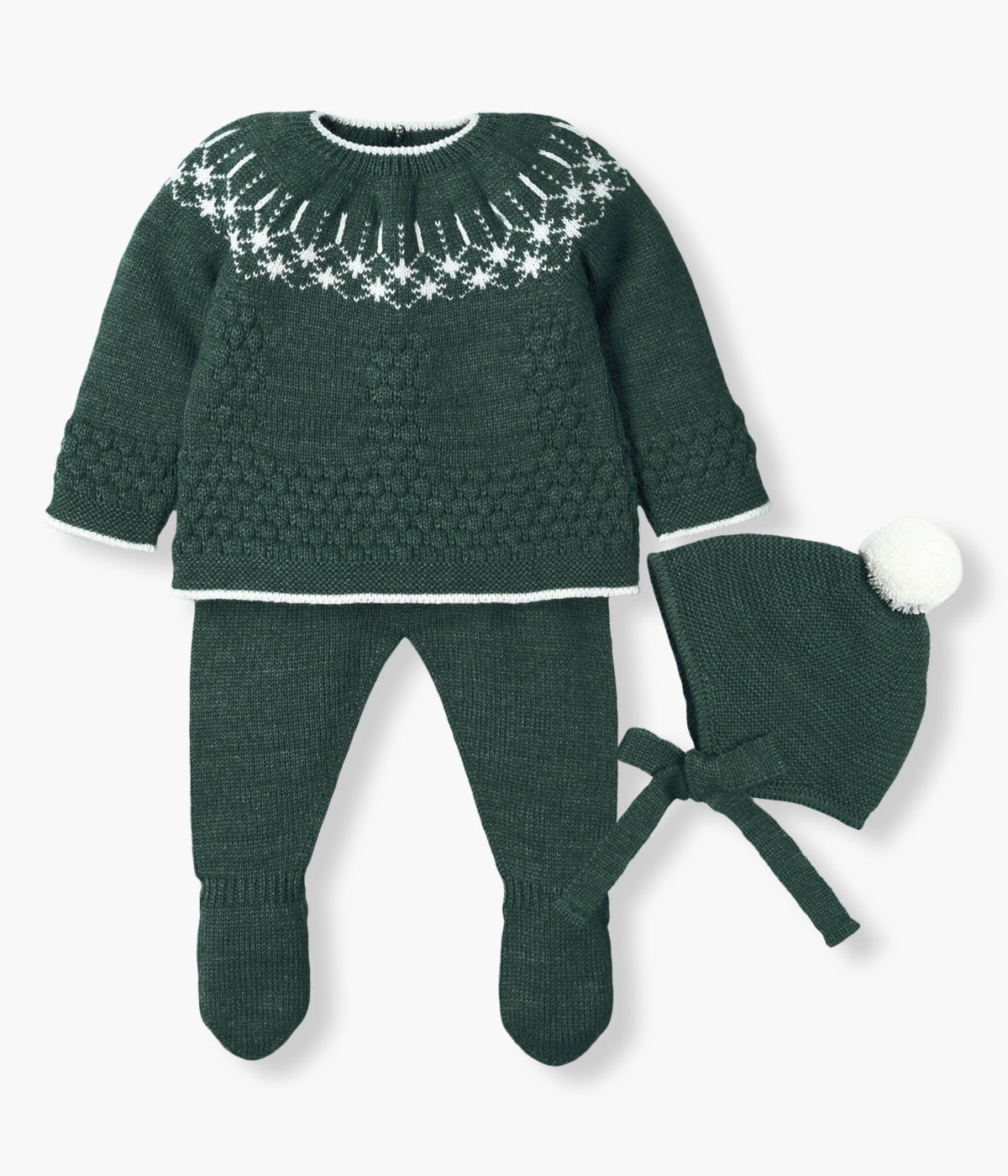 Conjunto de 3 peças em malha verde-escuro da Mac Ilusión composto por camisola, calças e gorro para bebé e recém-nascido(a). Camisola com detalhes em branco. Gorro com pompom branco e tiras para atar no queixo. Calças com pés.