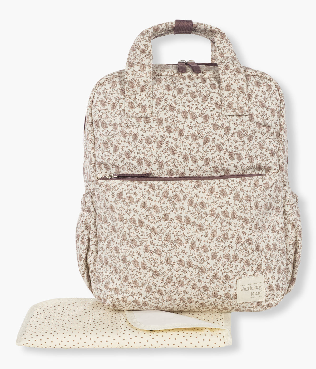 Mochila de Maternidade Walking Mum Gala Cerise com padrão ramos em tons de rosa com fundo pérola. Versátil mochila de maternidade com exterior em algodão com tratamento impermeável que combina elegância e funcionalidade, perfeita para os passeios com o bebé. Resguardo portátil incluído.