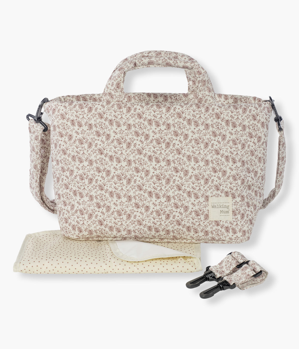 Bolsa de passeio Gala Cerise da Walking Mum. Com um encantador padrão ramos em tons de cereja com fundo pérola, esta bolsa de passeio possui um exterior em algodão com tratamento impermeável e oferece ampla capacidade e múltiplos bolsos para organizar tudo o que o bebé e os pais precisam nos passeios. Inclui resguardo portátil.