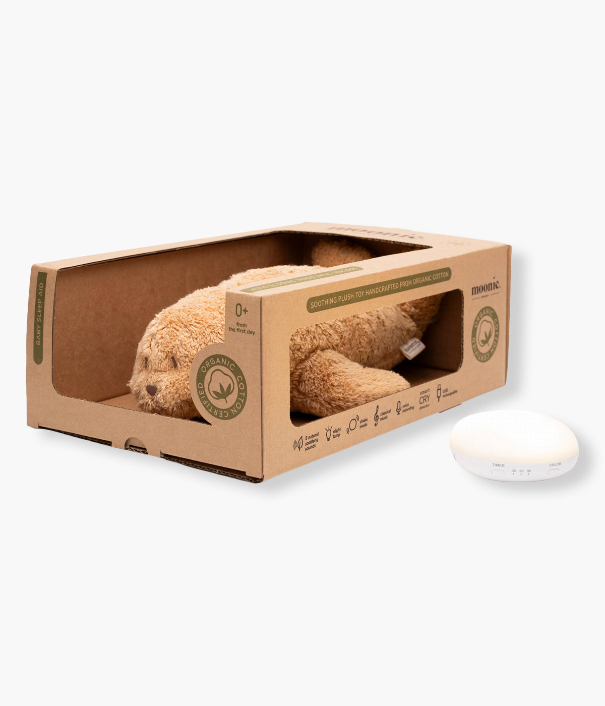 Vista dcom a caixa do Peluche Foca com Som e Luz Moonie Seal Cappuccino em Algodão Orgânico Bege