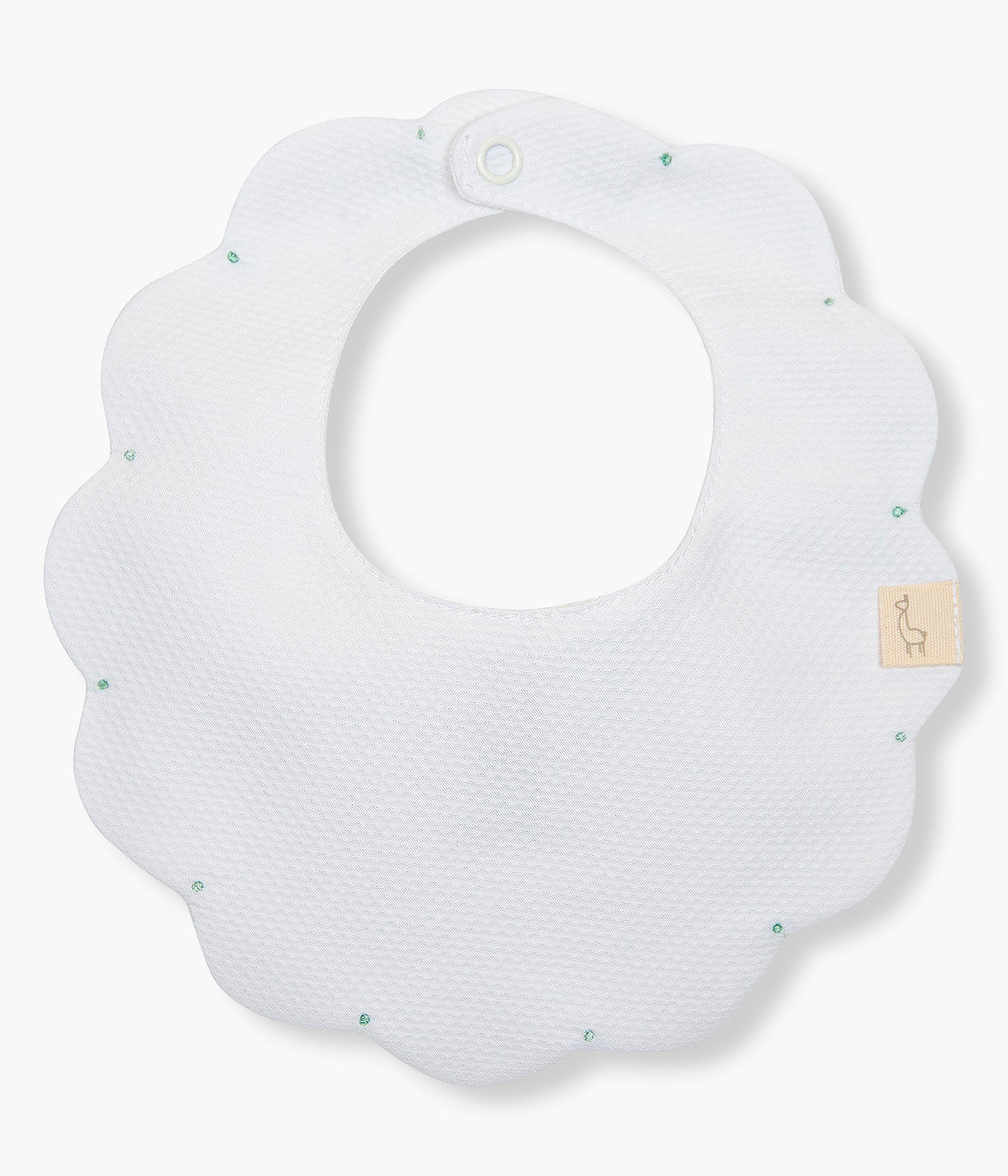 Babete impermeável branca da Baby Gi para bebé e recém-nascido(a), 100% algodão. Elegante babete em tecido piquet com rebordo ondulado e pequenas pintas bordadas em verde-menta.