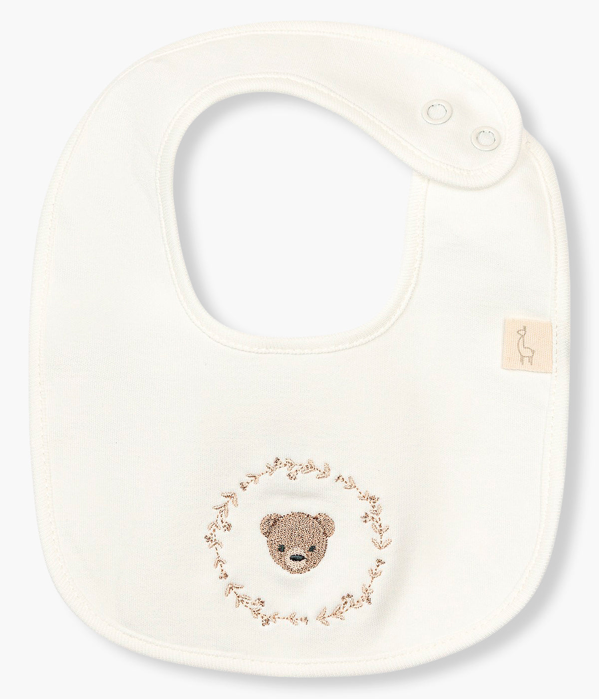 Vista frontal babete pérola da Baby Gi para bebé e recém-nascido(a), 100% algodão. Elegante babete de formato quadrado com fofo focinho de urso bordado na frente.